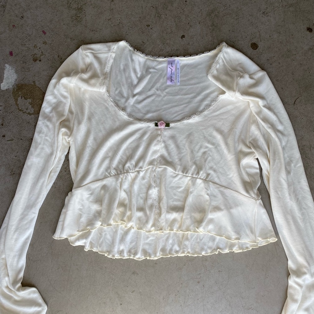 Out from under flower blouse